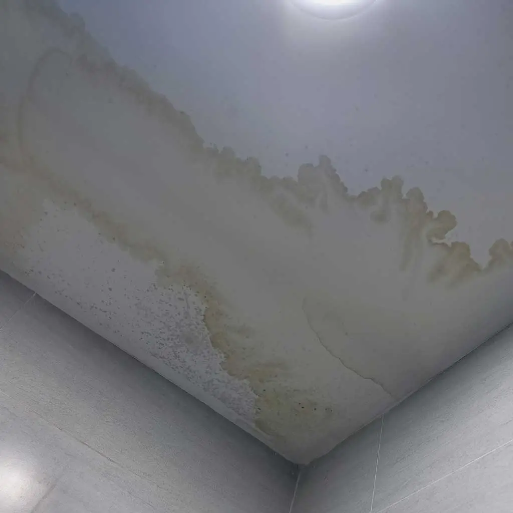 Water-stained ceiling caused by roof damage, inspected by Kuykendall Roofing in Charlotte County