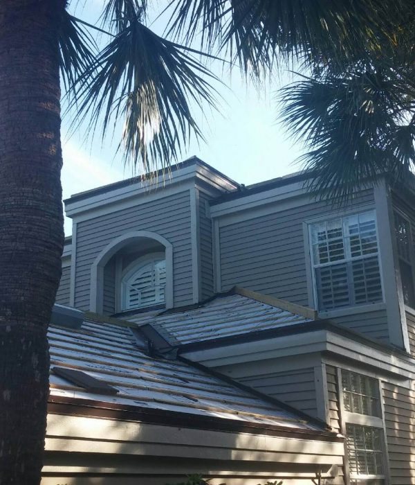 New Roof Install Kuykendall Roofing technician applying shingles during expert roof repairs in Florida, addressing storm and water damage